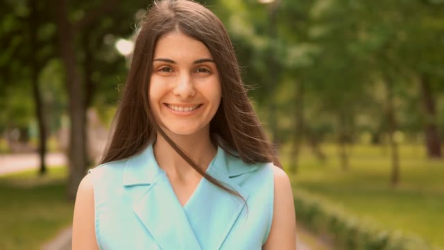Woman Smiling in Park