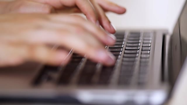 Typing on Laptop